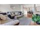Comfortable living room featuring hardwood floors and an adjacent dining area at 505 Redford Place Dr, Rolesville, NC 27571