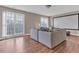 Modern living room with a large projector screen and hardwood floors at 505 Redford Place Dr, Rolesville, NC 27571