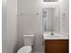 Simple and clean bathroom with white fixtures and light neutral walls at 650 Ganyard Farm Way # 4, Durham, NC 27703