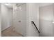 Hallway with access to a staircase and large closet space for ample storage at 650 Ganyard Farm Way # 4, Durham, NC 27703