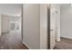 Spacious living room with hardwood floors and glass sliding doors leading to the outdoors at 650 Ganyard Farm Way # 4, Durham, NC 27703