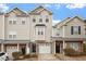 Charming townhome featuring neutral siding, a bay window, and a single-car garage at 650 Ganyard Farm Way # 4, Durham, NC 27703