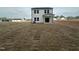 Spacious sodded backyard, showcasing ample space for outdoor activities and landscaping opportunities at 6814 Galloway Dr, Middlesex, NC 27557