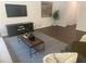Inviting living room features stylish furnishings and a modern rug, offering a comfortable gathering space at 6814 Galloway Dr, Middlesex, NC 27557