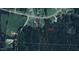 An aerial view shows the approximate boundaries of a wooded residential property with road frontage at 7850 Nc 42, Holly Springs, NC 27540