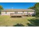 View of backyard with deck and house at 7850 Nc 42, Holly Springs, NC 27540