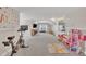 Spacious bonus room featuring wainscotting, plush carpeting and is perfect for a playroom or home gym at 811 S First St, Smithfield, NC 27577