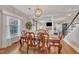 Elegant dining room features hardwood floors and a decorative light fixture at 811 S First St, Smithfield, NC 27577