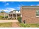 Brick house with a covered patio and a shed on a well maintained lot at 811 S First St, Smithfield, NC 27577