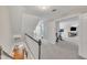 Upstairs hallway with views of the bedrooms, exercise area, and staircase at 811 S First St, Smithfield, NC 27577