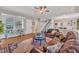 Spacious living room with hardwood floors, fireplace, and comfortable seating arrangement at 811 S First St, Smithfield, NC 27577