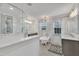 Luxurious main bathroom with soaking tub, dual sinks, and glass shower at 811 S First St, Smithfield, NC 27577