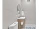 Chic powder room with modern vanity, stylish mirror, and decorative tile flooring at 811 S First St, Smithfield, NC 27577