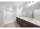 Bright bathroom features double sinks, soaking tub and separate shower at 92 Ripple Way # 315, Clayton, NC 27520