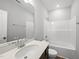 Bathroom with a white countertop vanity, a sink, and a shower/tub at 92 Ripple Way # 315, Clayton, NC 27520
