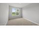 Cozy bedroom with large window offering views of the outside at 92 Ripple Way # 315, Clayton, NC 27520