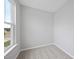 Cozy carpeted bedroom with natural light from a window at 92 Ripple Way # 315, Clayton, NC 27520