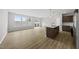 Bright and airy living room adjacent to a modern kitchen and sliding doors to the patio at 92 Ripple Way # 315, Clayton, NC 27520