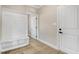 Bright entryway features built-in storage, white trim, and a door leading to another room at 9246 Otter Ct, Middlesex, NC 27557