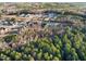 Expansive aerial view showcasing the community and surrounding greenery at 955 Lynch Rd, Selma, NC 27576