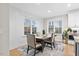 Bright dining room with lots of natural light, neutral colors and view of the backyard at 955 Lynch Rd, Selma, NC 27576