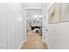 Hallway view into the living room, showcasing the home's open layout and modern design at 955 Lynch Rd, Selma, NC 27576