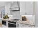 Close-up of the updated kitchen with white subway tile and modern appliances at 955 Lynch Rd, Selma, NC 27576