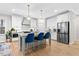 Spacious eat-in kitchen featuring a center island with barstool seating and modern appliances at 955 Lynch Rd, Selma, NC 27576