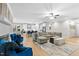Bright living room boasts modern furnishings, an open floor plan, and seamless flow to the kitchen and dining areas at 955 Lynch Rd, Selma, NC 27576