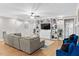 Bright living room with an entertainment center and a comfortable seating area, ideal for relaxation and gatherings at 955 Lynch Rd, Selma, NC 27576