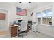 Inviting home office with a large desk, computer and a window for lots of natural light at 955 Lynch Rd, Selma, NC 27576