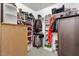 Spacious walk-in closet featuring custom shelving, hanging rods, and ample storage space for clothes and accessories at 955 Lynch Rd, Selma, NC 27576