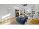 Cozy living room featuring a fireplace, plush seating, and ample natural light at 1 Nicklaus Way, Clayton, NC 27520