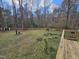 Overhead deck view of a backyard area including an overgrown garden at 1025 Shellrock Dr Dr, Wake Forest, NC 27587