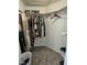 Walk-in closet with ample storage space and organized clothing racks at 1025 Shellrock Dr Dr, Wake Forest, NC 27587