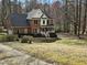 Lovely brick residence featuring classic architectural details and a lush green lawn at 1025 Shellrock Dr Dr, Wake Forest, NC 27587