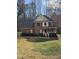 Traditional brick home boasts a well-manicured lawn and inviting front entry, surrounded by mature trees at 1025 Shellrock Dr Dr, Wake Forest, NC 27587