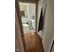 Hallway view to a bathroom with a modern vanity at 1025 Shellrock Dr Dr, Wake Forest, NC 27587