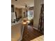 Open kitchen featuring granite countertops, hardwood floors, and a cozy breakfast nook at 1025 Shellrock Dr Dr, Wake Forest, NC 27587