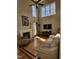 Spacious living room with fireplace, hardwood floors, and natural light at 1025 Shellrock Dr Dr, Wake Forest, NC 27587