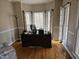 Bright office space featuring natural light from the large windows and hardwood flooring at 1025 Shellrock Dr Dr, Wake Forest, NC 27587