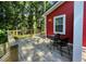 Back deck with table and chairs over looking the back yard at 105 Johnson St, Chapel Hill, NC 27516