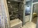 Modern bathroom with marble surround in the shower and black faucet at 105 Johnson St, Chapel Hill, NC 27516