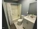 This bathroom offers a shower and tub combo with a large single sink vanity at 105 Johnson St, Chapel Hill, NC 27516