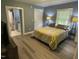 This bedroom is connected to the bathroom and has hard wood floors and a large window at 105 Johnson St, Chapel Hill, NC 27516