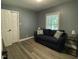 Bedroom with hardwood floors, natural light, and closet at 105 Johnson St, Chapel Hill, NC 27516