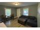 Comfortable living room with hardwood floors, modern lighting, and plenty of natural light at 105 Johnson St, Chapel Hill, NC 27516