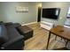 Comfortable living room with hardwood floors, modern lighting, and plenty of natural light at 105 Johnson St, Chapel Hill, NC 27516