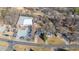 Aerial shot of homes, large shop, and surrounding landscape at 1127 W Webb Ave, Burlington, NC 27217