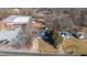 An aerial perspective of quaint houses near a commercial building, exhibiting proximity and convenience at 1127 W Webb Ave, Burlington, NC 27217